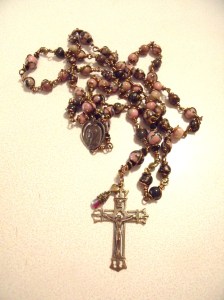pink, black picture jasper, bronze crucifix and center